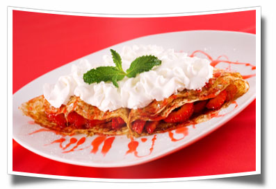 Enjoy delicious strawberry crepes for breakfast when you stay at Iowa's Okoboji Country Inn